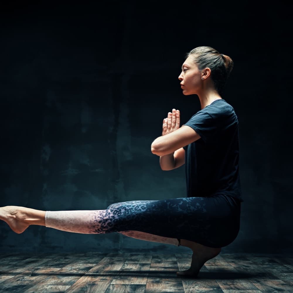 A woman resting calmly, wearing a fitness tracker